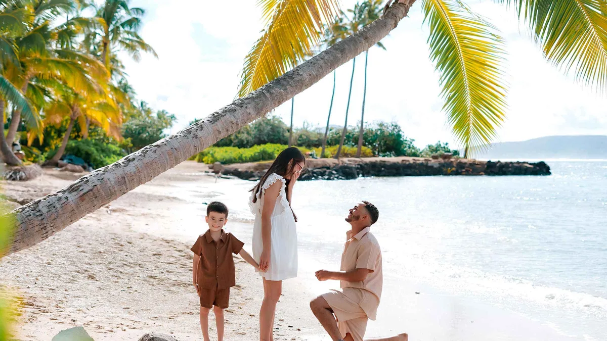 Family photographed on a west Maui beach near Lahaina during a private vacation photoshoot in Hawaii